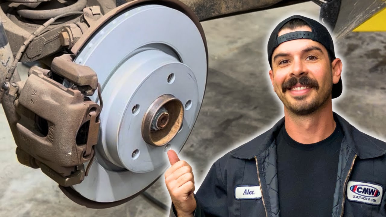 Mechanic Replacing Brake Pads and Rotors