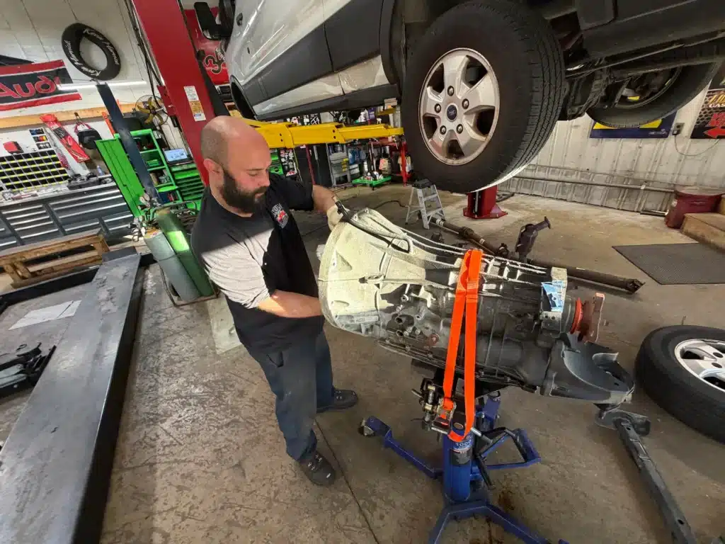 Mechanic Working on Transmission